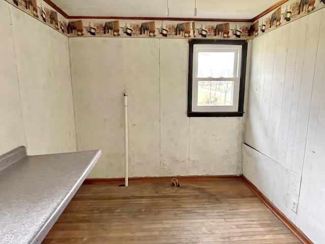 spare room with hardwood / wood-style floors