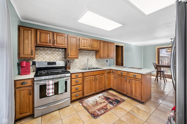 8847 E Northshore Dr, Unionville, IN 47468 - kitchen featuring light countertops, a peninsula, a sink, and stainless steel appliances