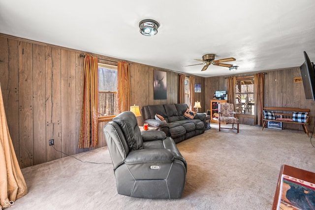 8847 E Northshore Dr, Unionville, IN 47468 - living area featuring a wealth of natural light, wooden walls, and light carpet