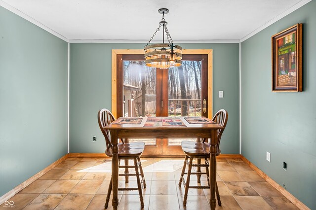 8847 E Northshore Dr, Unionville, IN 47468 - dining room featuring baseboards, an inviting chandelier, and ornamental molding