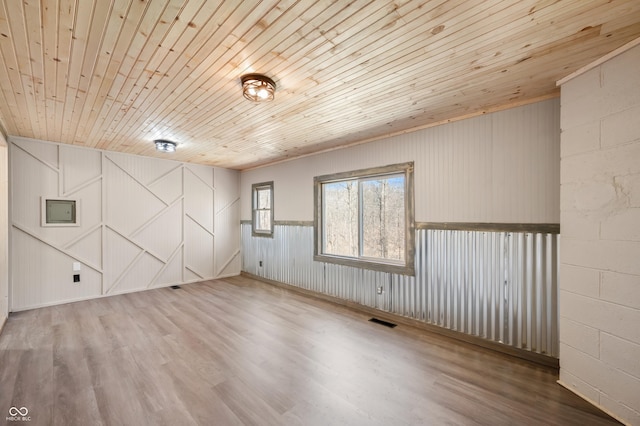 8847 E Northshore Dr, Unionville, IN 47468 - spare room with visible vents, wooden ceiling, and wood finished floors