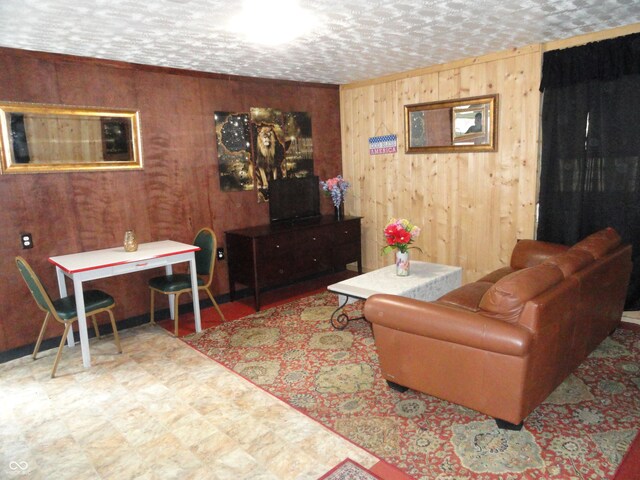 1722 N Parker Ave, Indianapolis, IN 46218 - living room featuring wooden walls and tile patterned floors