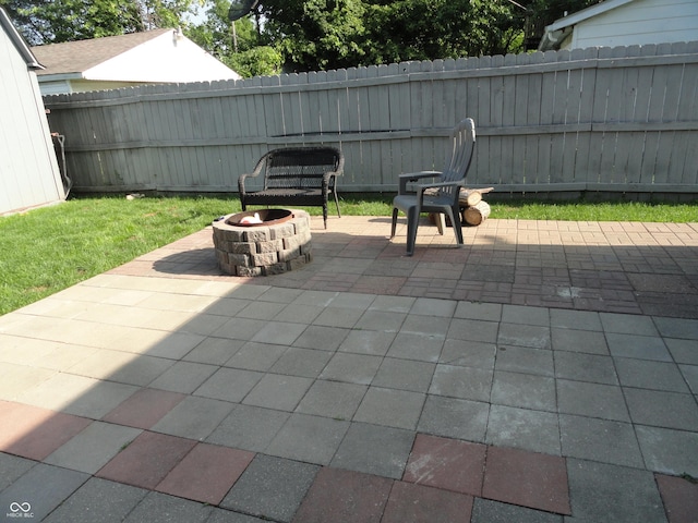 1722 N Parker Ave, Indianapolis, IN 46218 - view of patio with an outdoor fire pit