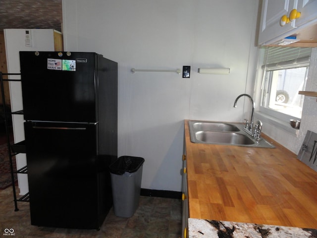 1722 N Parker Ave, Indianapolis, IN 46218 - kitchen with freestanding refrigerator and butcher block countertops