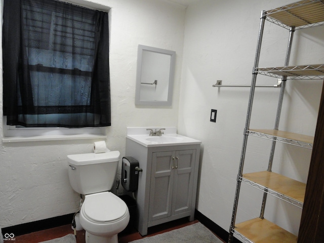 1722 N Parker Ave, Indianapolis, IN 46218 - bathroom featuring toilet and vanity