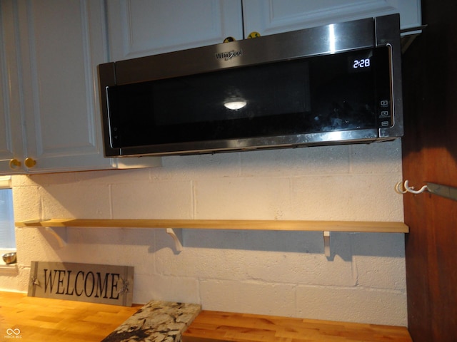1722 N Parker Ave, Indianapolis, IN 46218 - kitchen view of stainless steel microwave