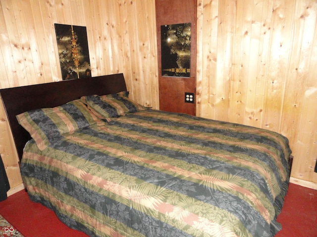 1722 N Parker Ave, Indianapolis, IN 46218 - bedroom featuring carpet and wooden walls