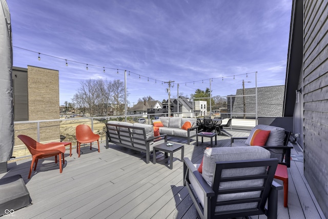 deck with an outdoor hangout area