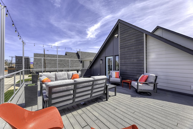 wooden deck with outdoor lounge area