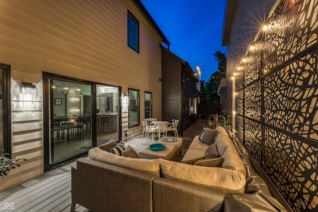 exterior space with an outdoor living space and a deck