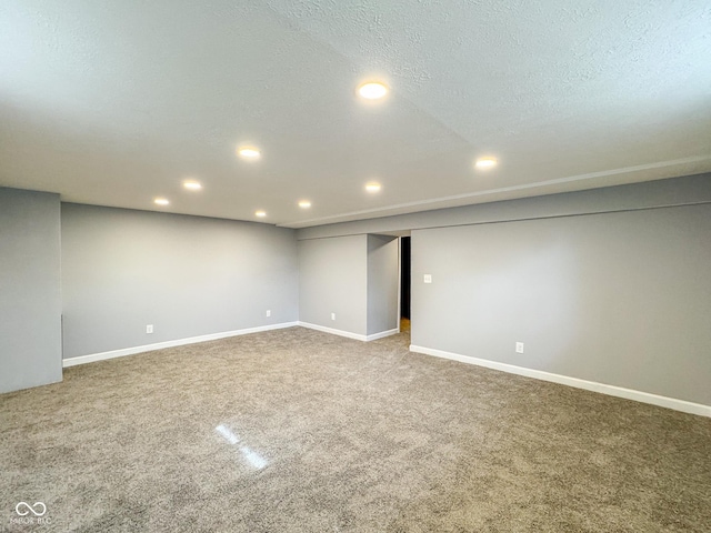 9362 Helmsdale Dr, Indianapolis, IN 46256 - finished below grade area with carpet, baseboards, and recessed lighting