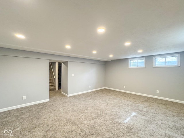 9362 Helmsdale Dr, Indianapolis, IN 46256 - below grade area featuring recessed lighting, baseboards, carpet flooring, and stairs