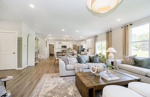 827 Allandale Ave, Westfield, IN 46074 - living room featuring light wood-style flooring, recessed lighting, and baseboards