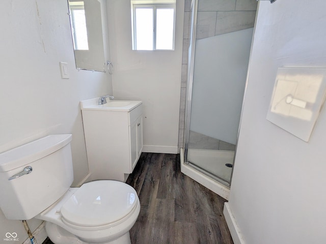 408 E Beecher St, Indianapolis, IN 46225 - full bath featuring vanity, toilet, a shower stall, wood finished floors, and baseboards