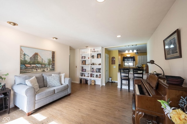 30 Sleepy Hollow Ct, Westfield, IN 46074 - living room with baseboards, recessed lighting, and wood finished floors