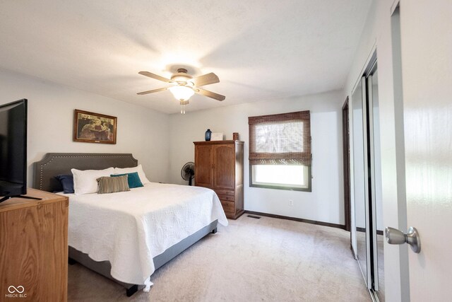 30 Sleepy Hollow Ct, Westfield, IN 46074 - bedroom with baseboards, a ceiling fan, visible vents, and light carpet