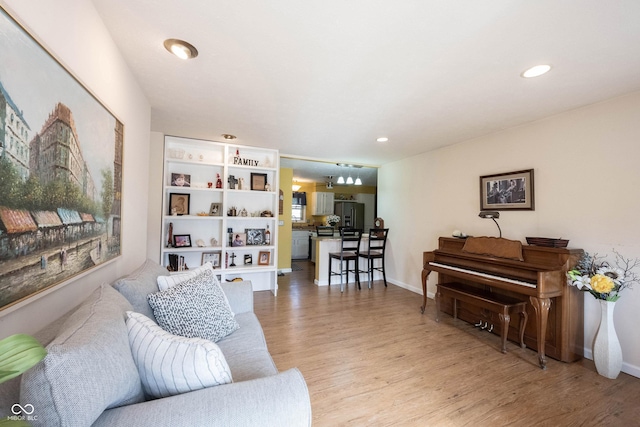 30 Sleepy Hollow Ct, Westfield, IN 46074 - living room with recessed lighting, baseboards, and light wood finished floors