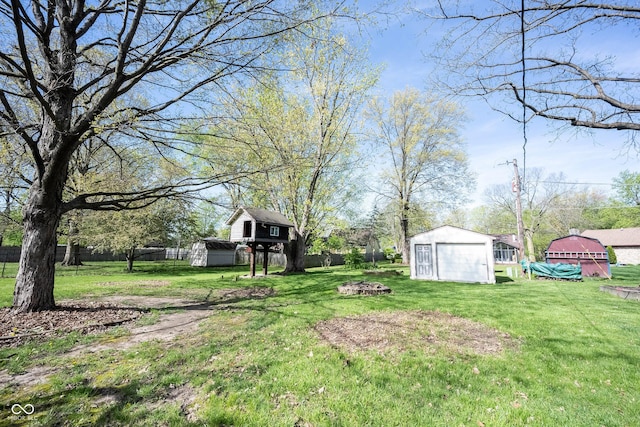 30 Sleepy Hollow Ct, Westfield, IN 46074 - view of yard with an outdoor structure, an outdoor fire pit, and a shed