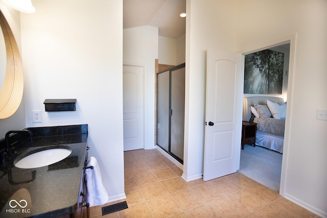 1060 Cape Coral Dr, Cicero, IN 46034 - ensuite bathroom with visible vents, baseboards, a shower stall, ensuite bath, and vanity