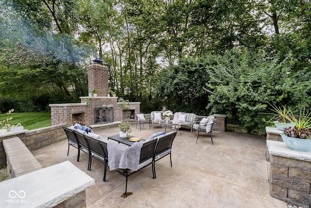 1060 Cape Coral Dr, Cicero, IN 46034 - view of patio featuring an outdoor living space with a fireplace