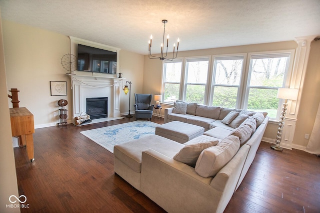 1060 Cape Coral Dr, Cicero, IN 46034 - living room featuring a wealth of natural light, baseboards, a fireplace with flush hearth, and dark wood finished floors
