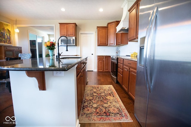 1060 Cape Coral Dr, Cicero, IN 46034 - kitchen with brown cabinetry, dark wood-type flooring, a sink, stainless steel appliances, and custom range hood