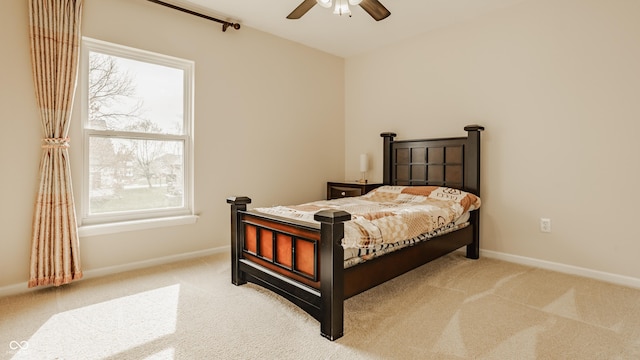 12561 Gladecrest Dr, Carmel, IN 46033 - carpeted bedroom with baseboards and ceiling fan
