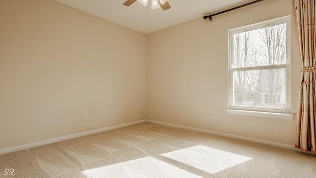 12561 Gladecrest Dr, Carmel, IN 46033 - unfurnished room featuring light carpet, ceiling fan, baseboards, and healthy amount of natural light