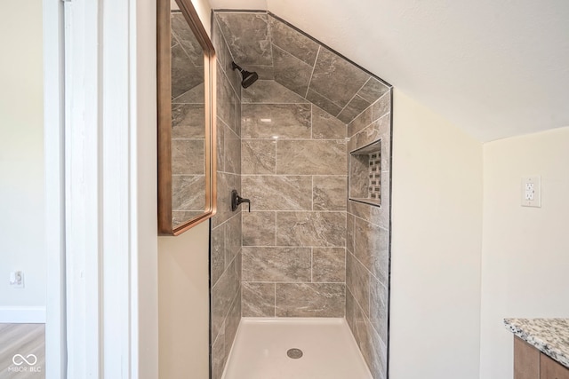 bathroom featuring a stall shower