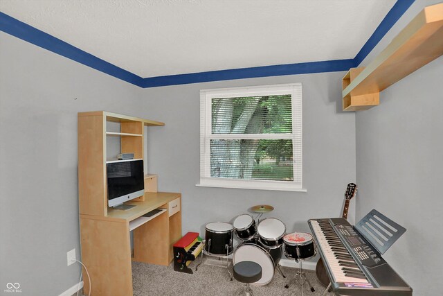 home office featuring carpet flooring and baseboards