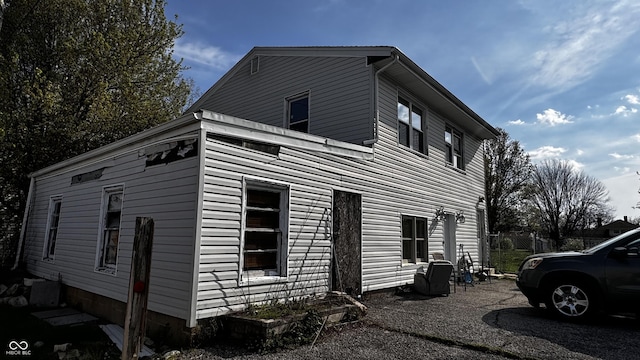 view of side of property with fence