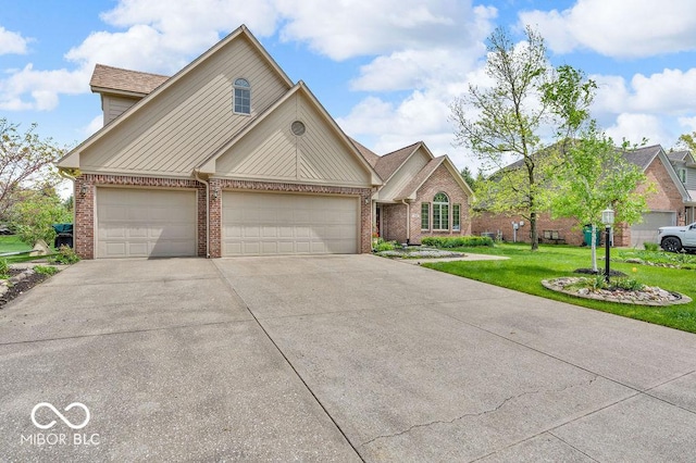 7113 Lakeside Woods Dr, Indianapolis, IN 46278 - traditional home with brick siding, driveway, a garage, and a front lawn