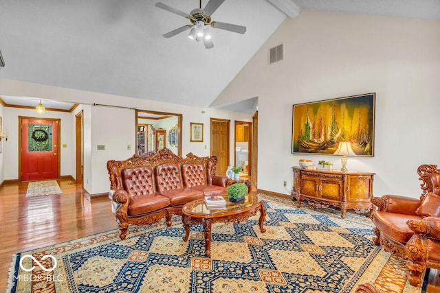 7113 Lakeside Woods Dr, Indianapolis, IN 46278 - living room featuring beamed ceiling, baseboards, wood finished floors, a ceiling fan, and high vaulted ceiling