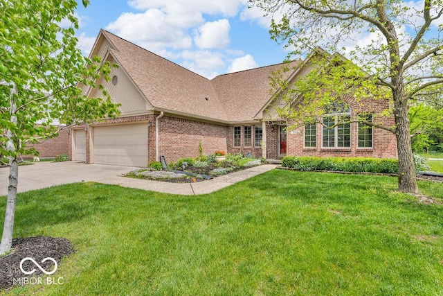 7113 Lakeside Woods Dr, Indianapolis, IN 46278 - view of front of house with brick siding, a front yard, driveway, an attached garage, and a shingled roof