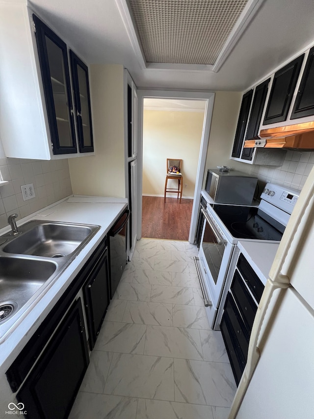 kitchen with black dishwasher, light countertops, marble finish floor, dark cabinetry, and white range with electric stovetop