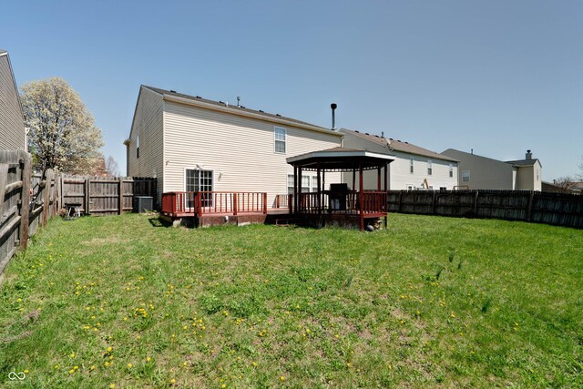 10597 Cyrus Dr, Indianapolis, IN 46231 - back of property featuring a gazebo, central AC unit, and a wooden deck