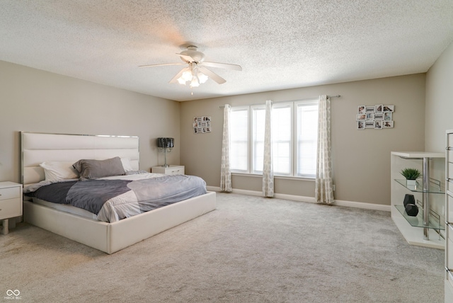 10597 Cyrus Dr, Indianapolis, IN 46231 - carpeted bedroom featuring ceiling fan, a textured ceiling, and baseboards