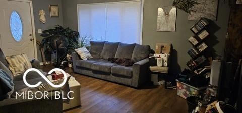 living room with wood finished floors