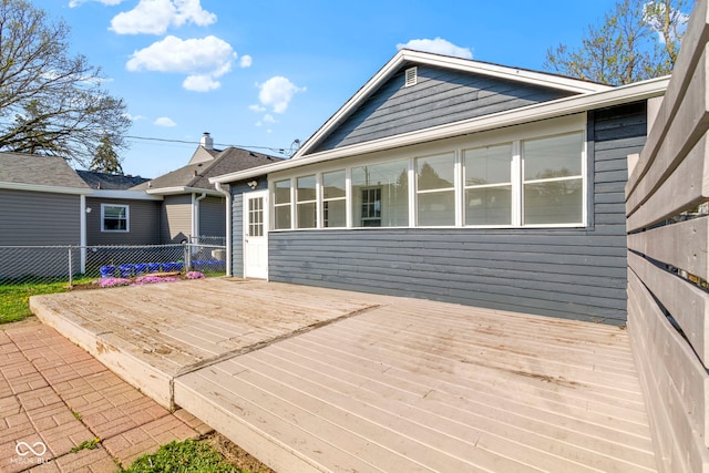 67 S 9th Ave, Beech Grove, IN 46107 - exterior space with fence, a wooden deck, and a sunroom