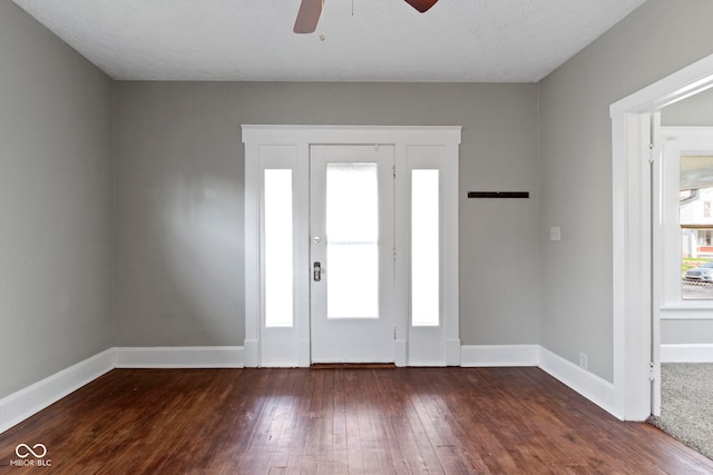 67 S 9th Ave, Beech Grove, IN 46107 - foyer entrance with ceiling fan, baseboards, and hardwood / wood-style floors