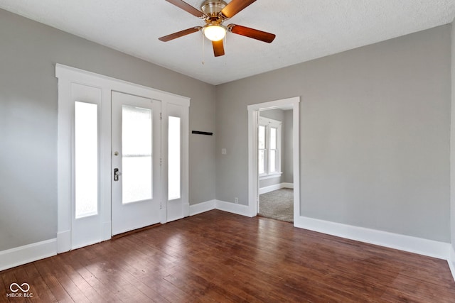 67 S 9th Ave, Beech Grove, IN 46107 - foyer entrance featuring dark wood-type flooring, a ceiling fan, and baseboards