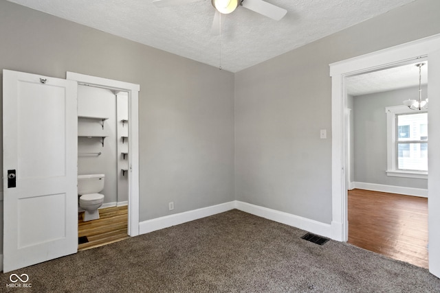 67 S 9th Ave, Beech Grove, IN 46107 - unfurnished bedroom featuring baseboards, visible vents, carpet floors, and a textured ceiling