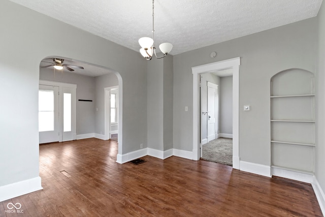 67 S 9th Ave, Beech Grove, IN 46107 - interior space featuring wood finished floors, ceiling fan with notable chandelier, arched walkways, built in features, and baseboards