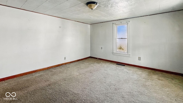 3346 S Lockburn St, Indianapolis, IN 46221 - carpeted empty room with baseboards and visible vents