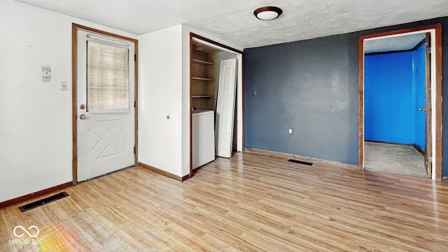 3346 S Lockburn St, Indianapolis, IN 46221 - unfurnished bedroom featuring a closet, light wood finished floors, visible vents, and baseboards