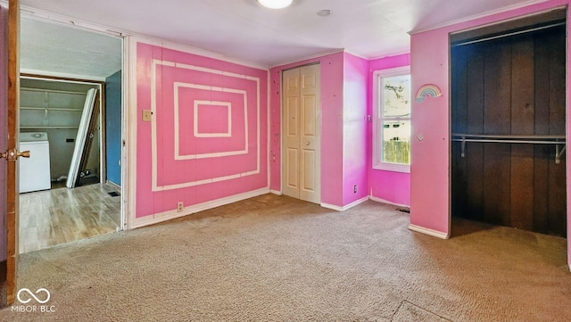 3346 S Lockburn St, Indianapolis, IN 46221 - unfurnished bedroom with crown molding, carpet floors, baseboards, and washer / dryer