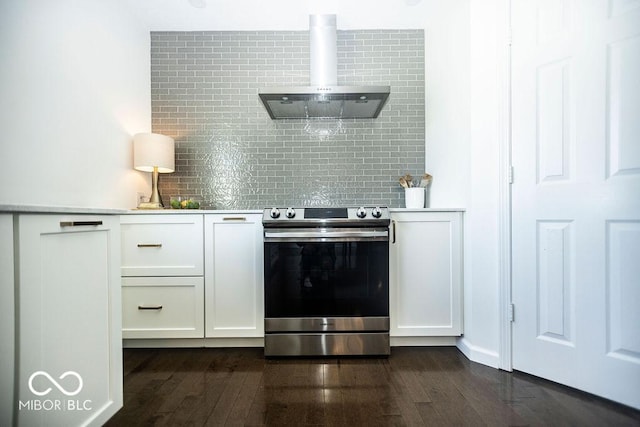 3896 Woods Bay Ln, Plainfield, IN 46168 - kitchen with wall chimney range hood, light countertops, white cabinetry, backsplash, and stainless steel range with electric cooktop