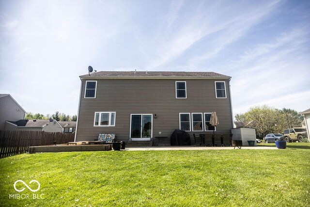 3896 Woods Bay Ln, Plainfield, IN 46168 - rear view of house with a lawn, a patio, and fence