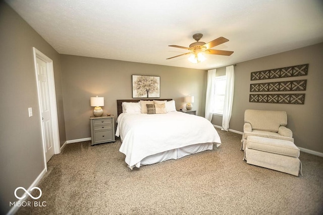 3896 Woods Bay Ln, Plainfield, IN 46168 - carpeted bedroom featuring baseboards and a ceiling fan