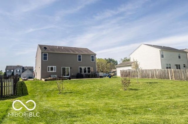 3896 Woods Bay Ln, Plainfield, IN 46168 - back of property with a yard and fence